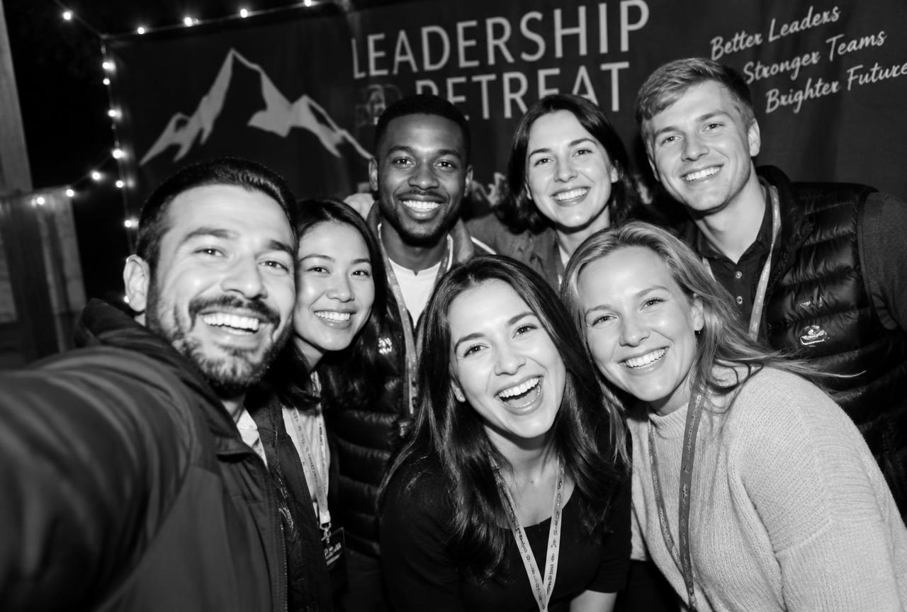 Leadership retreat attendees taking a group selfie